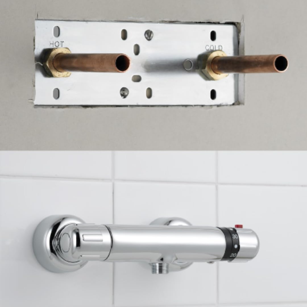 Shower fixing plate mounted behind wall with brass pipe ends and screw holes