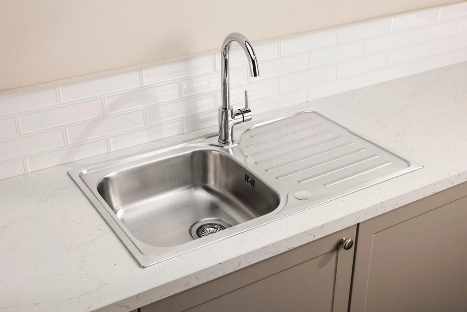 Stainless steel inset kitchen sink with drainer and chrome mixer tap