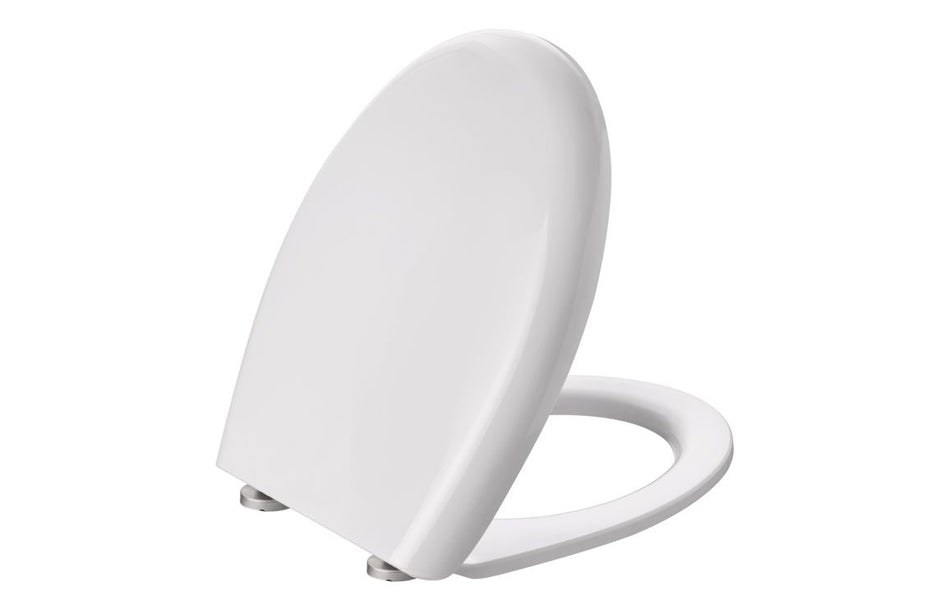White soft-close toilet seat with lid closed and visible hinges at the base