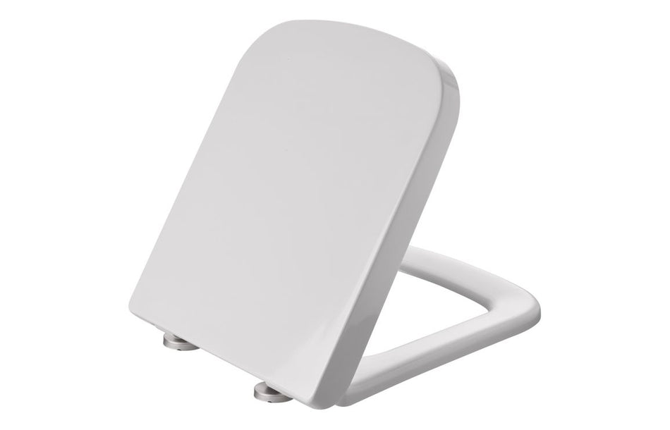 White wrapover soft-close toilet seat with rounded lid and metal hinges