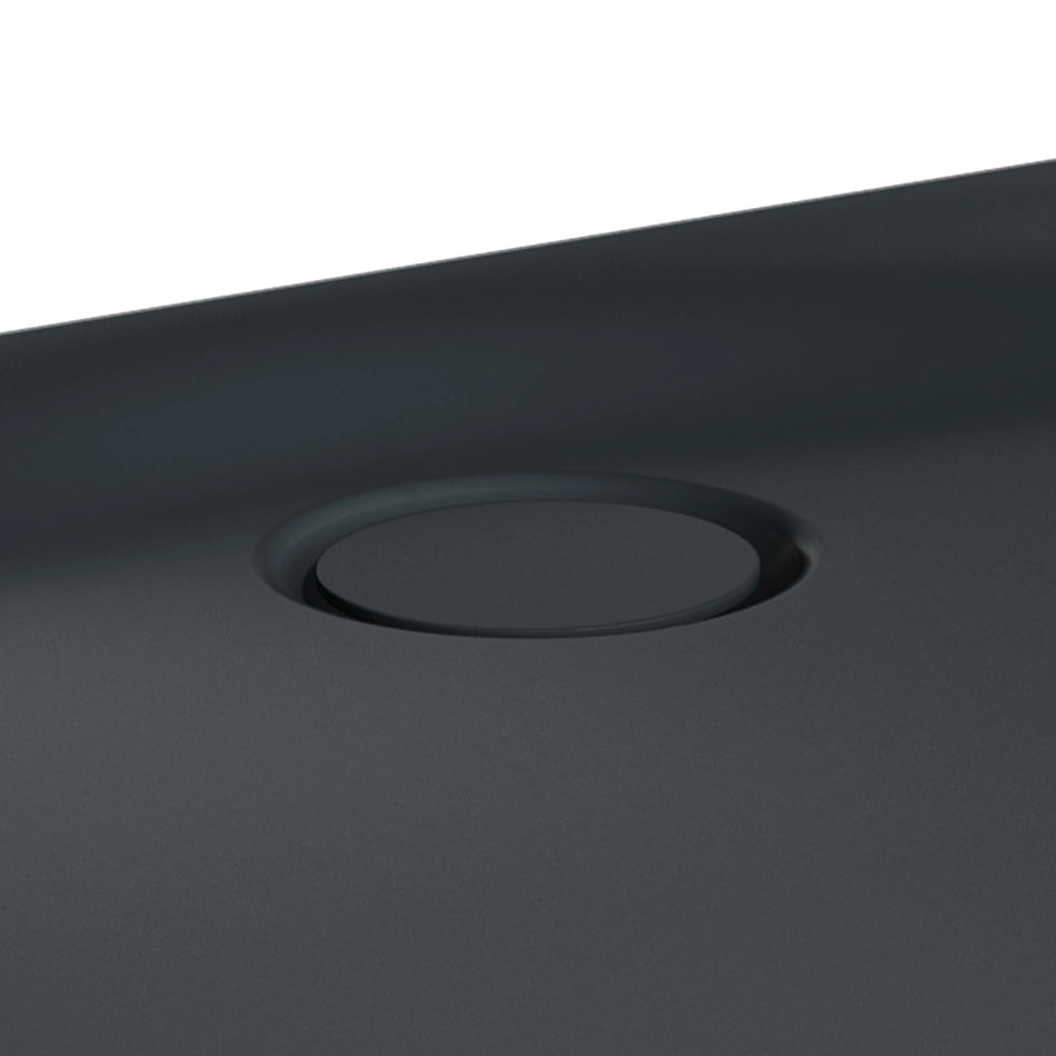 Matt anthracite shower tray waste drain outlet with round opening